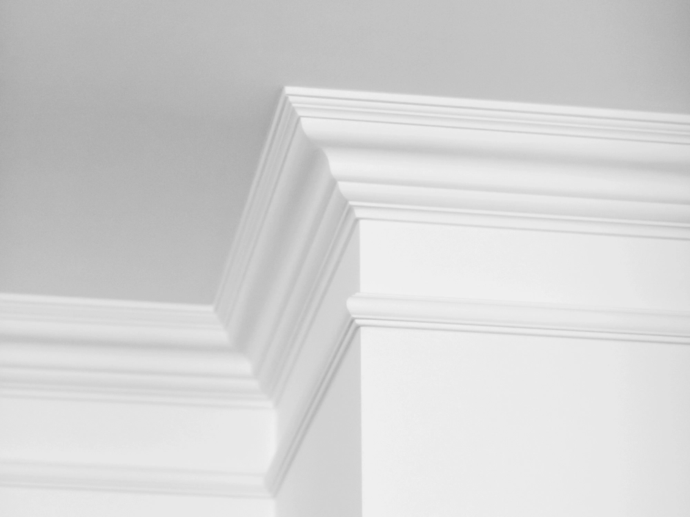 Close-up of elegant white crown molding